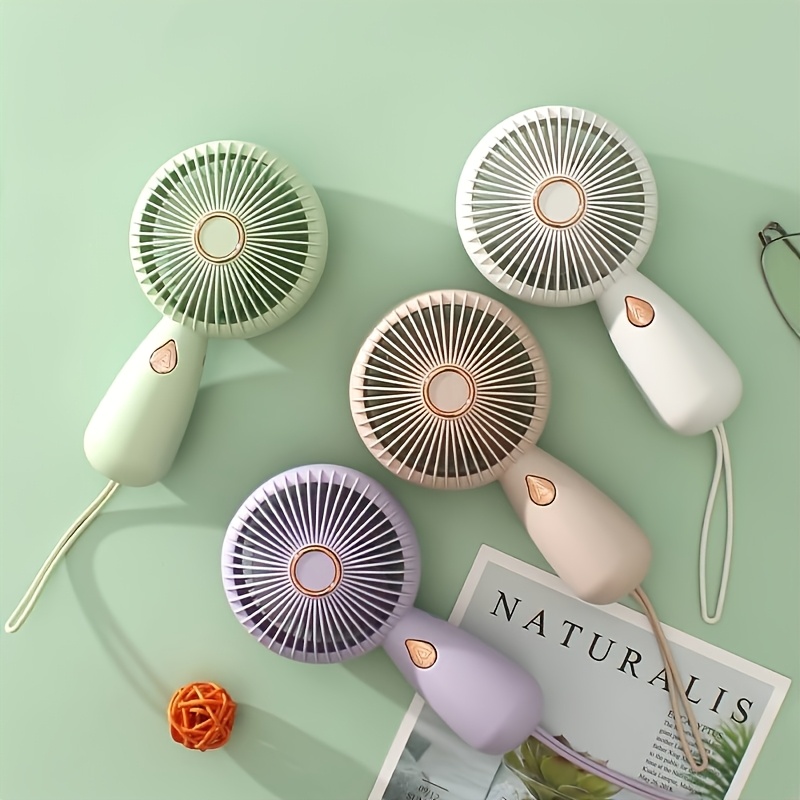 Mão segurando ventilador peque - Fan Desk Small Usb avaliação e preço
