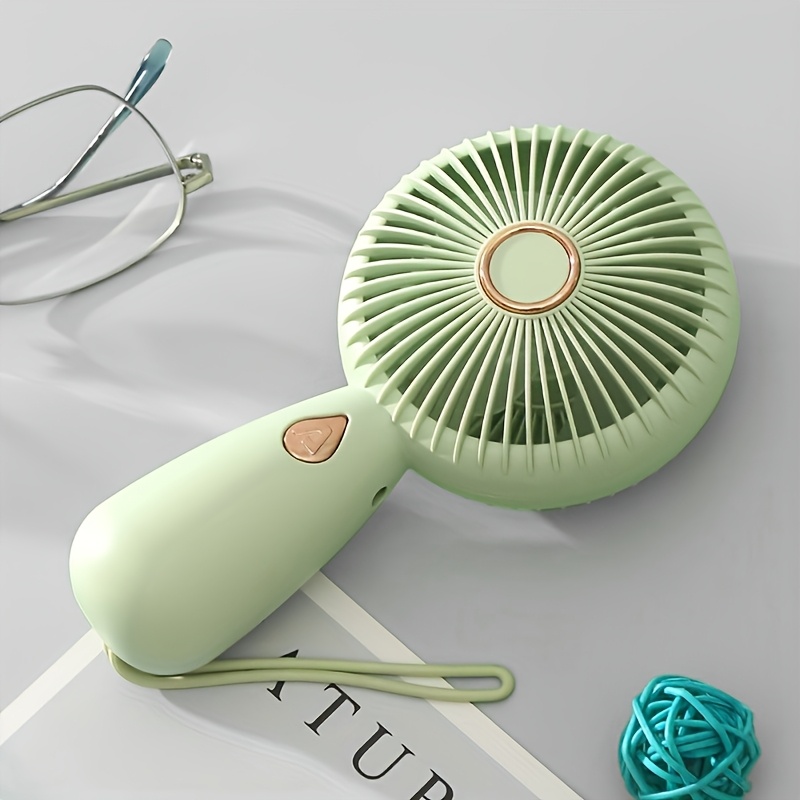 Mão segurando ventilador peque - Fan Desk Small Usb avaliação e preço